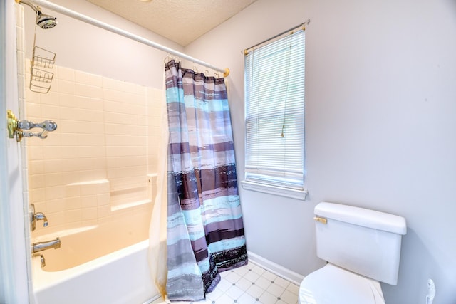 106 Trimley Ct, Goose Creek, SC 29445 - bathroom featuring healthy amount of natural light, toilet, shower / bath combo, a textured ceiling, and baseboards