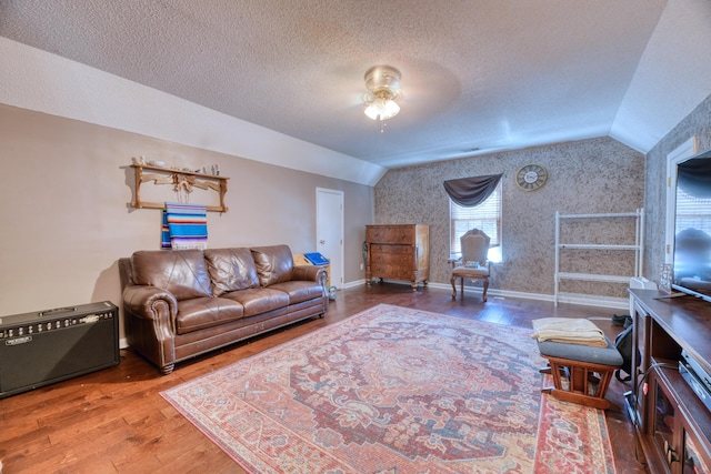 106 Trimley Ct, Goose Creek, SC 29445 - living area with lofted ceiling, ceiling fan, wood finished floors, wallpapered walls, and baseboards