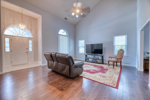 106 Trimley Ct, Goose Creek, SC 29445 - living area with high vaulted ceiling, a ceiling fan, a chandelier, dark wood finished floors, and baseboards