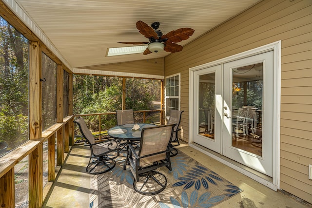 sunroom / solarium with french doors, ceiling fan, and lofted ceiling