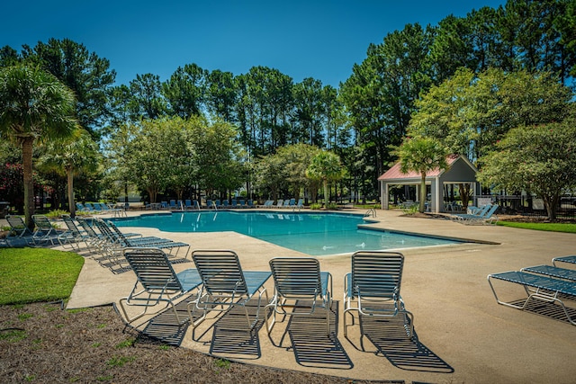 view of pool with a gazebo and a patio area