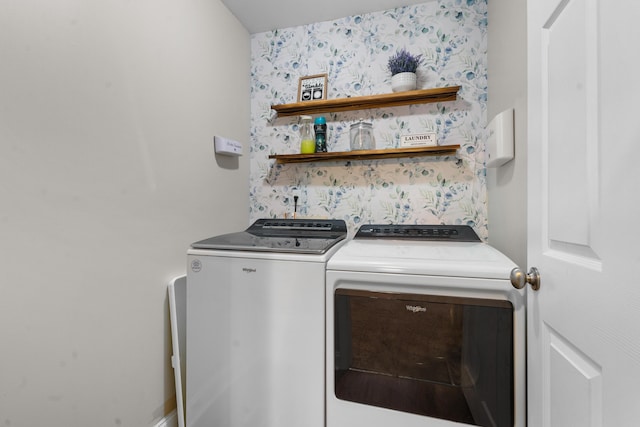 laundry room featuring separate washer and dryer