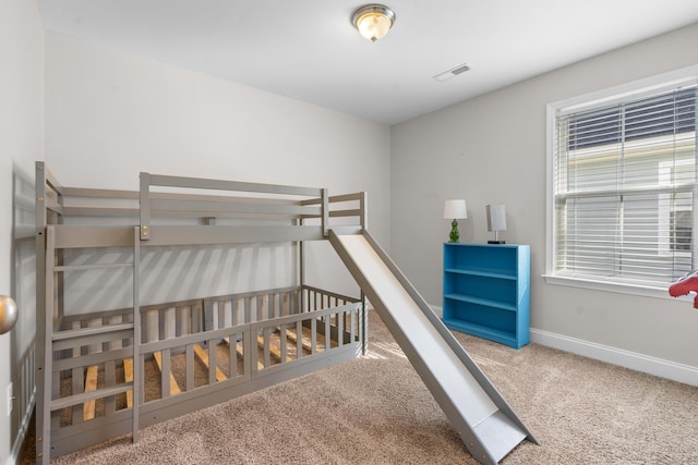 bedroom featuring carpet