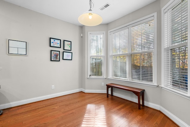 unfurnished room featuring hardwood / wood-style flooring