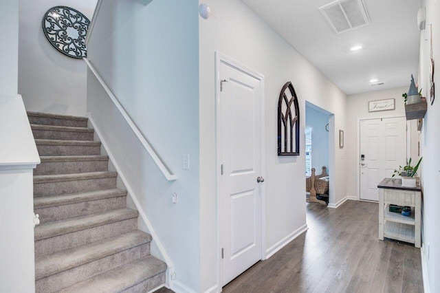 493 Spanish Wells Rd, Summerville, SC 29486 - staircase with wood finished floors and recessed lighting