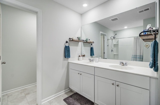 493 Spanish Wells Rd, Summerville, SC 29486 - bathroom with double vanity, a shower with shower curtain, and tile patterned floors