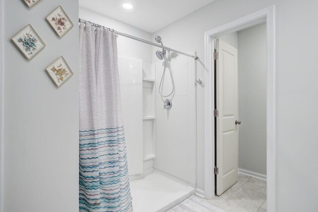 493 Spanish Wells Rd, Summerville, SC 29486 - bathroom with a stall shower and marble finish floors