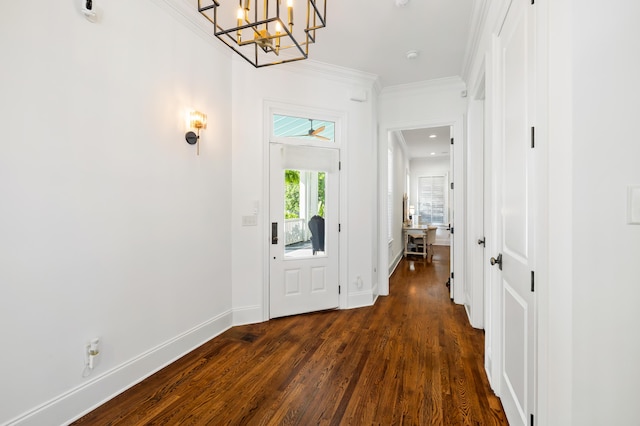 4009 E Amy Ln, Johns Island, SC 29455 - entryway with dark wood finished floors, ornamental molding, baseboards, and a chandelier