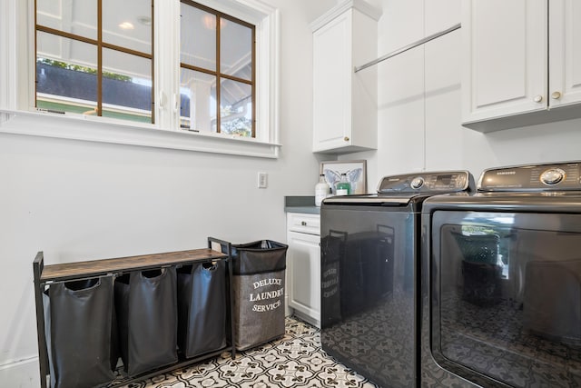 4009 E Amy Ln, Johns Island, SC 29455 - laundry area with washer and clothes dryer, cabinet space, and light tile patterned floors