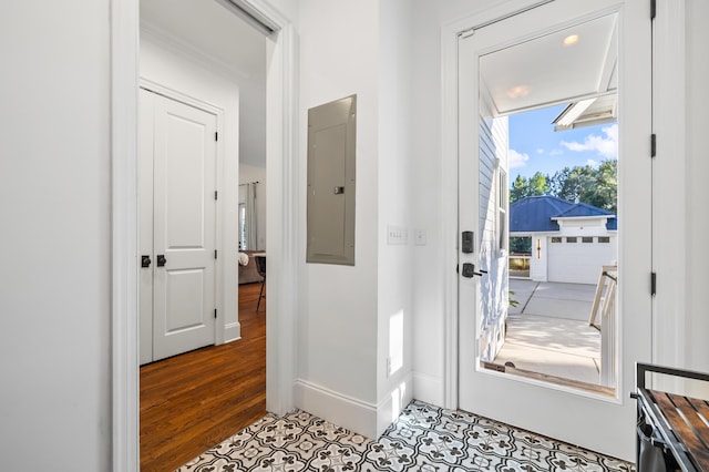 4009 E Amy Ln, Johns Island, SC 29455 - doorway to outside featuring electric panel, tile patterned floors, and baseboards