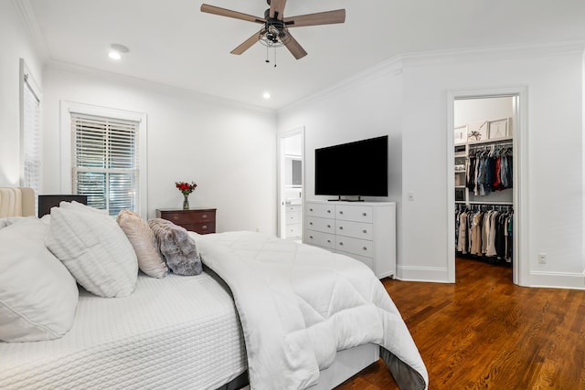 4009 E Amy Ln, Johns Island, SC 29455 - bedroom with crown molding, wood finished floors, a spacious closet, baseboards, and recessed lighting