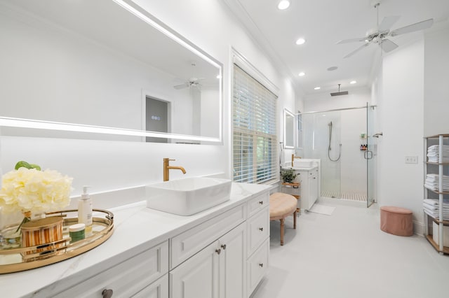 4009 E Amy Ln, Johns Island, SC 29455 - bathroom featuring ceiling fan, a stall shower, ornamental molding, vanity, and recessed lighting