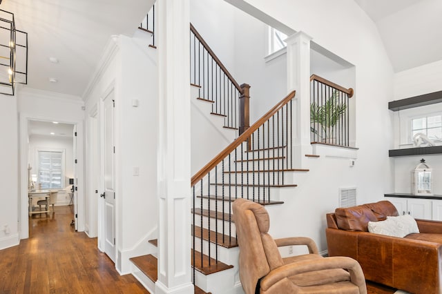 4009 E Amy Ln, Johns Island, SC 29455 - stairway with wood finished floors, a towering ceiling, and ornate columns
