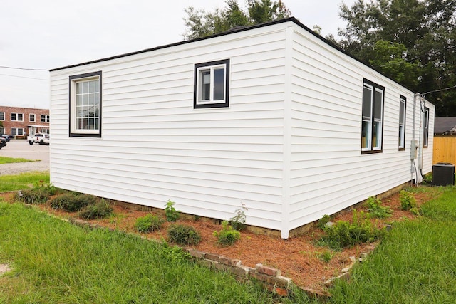 view of property exterior with cooling unit