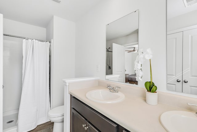 full bathroom with double vanity, a sink, and visible vents