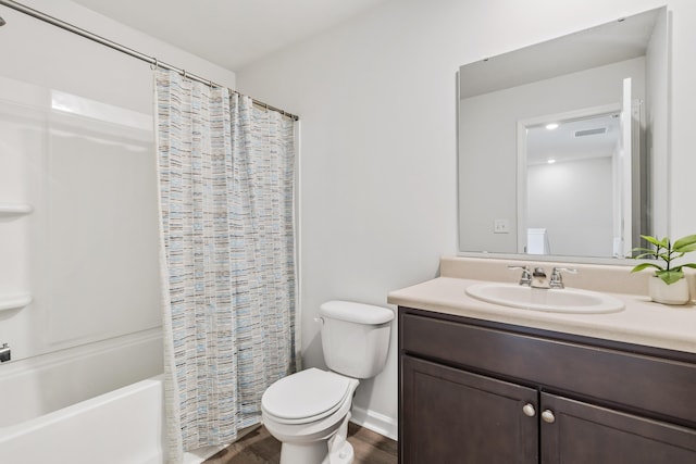 full bath featuring toilet, wood finished floors, vanity, visible vents, and shower / bath combination with curtain