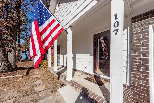 entrance to property with covered porch