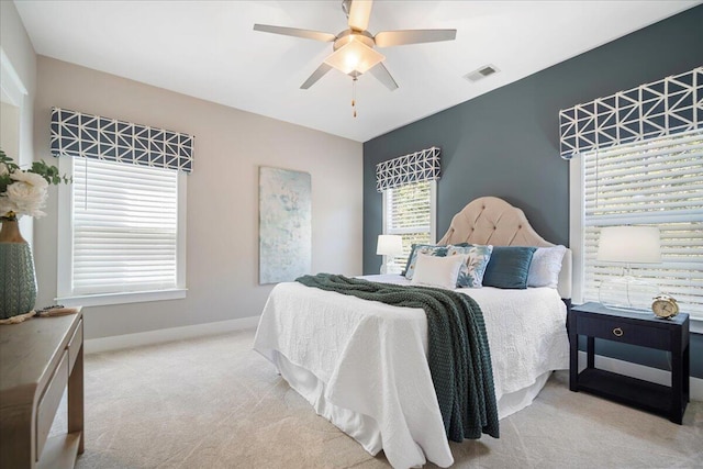 carpeted bedroom with ceiling fan