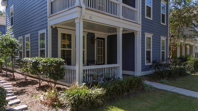 view of home's exterior with a balcony