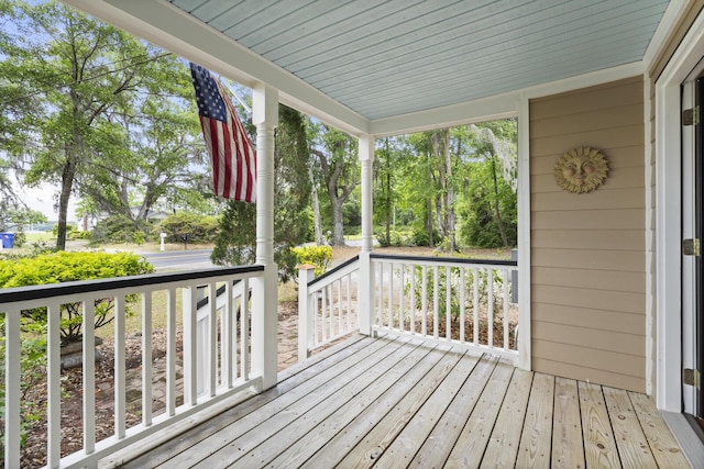 wooden deck featuring covered porch