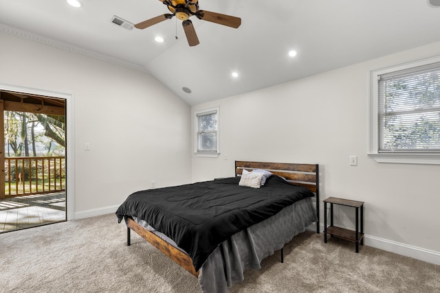 bedroom featuring vaulted ceiling, access to outside, multiple windows, and carpet