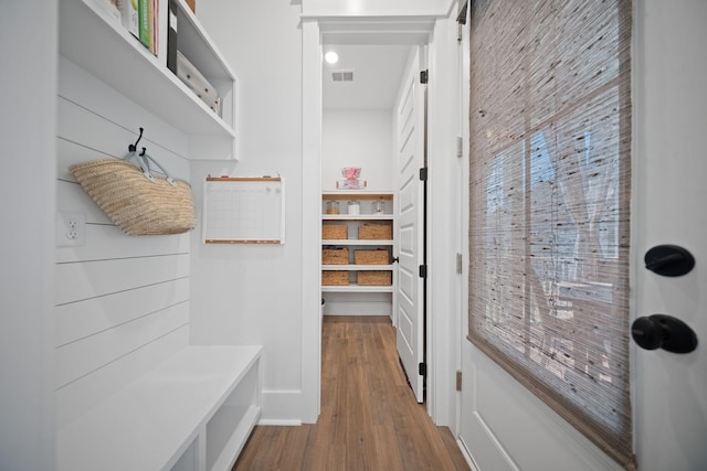 mudroom featuring visible vents and wood finished floors