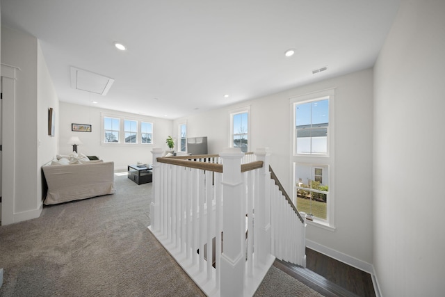 stairway with attic access, recessed lighting, baseboards, and visible vents