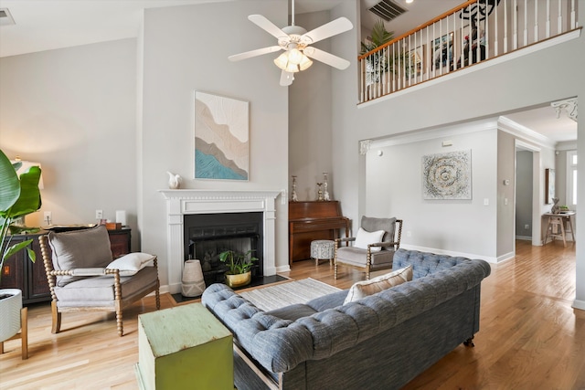 3526 Stockton Dr, Mount Pleasant, SC 29466 - living area with wood finished floors, a towering ceiling, visible vents, and ceiling fan