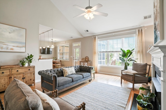 3526 Stockton Dr, Mount Pleasant, SC 29466 - living area featuring visible vents, ceiling fan, light wood-style floors, and a fireplace