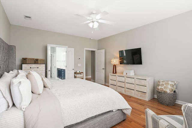 3526 Stockton Dr, Mount Pleasant, SC 29466 - bedroom featuring light wood-style floors, ceiling fan, ensuite bath, visible vents, and baseboards