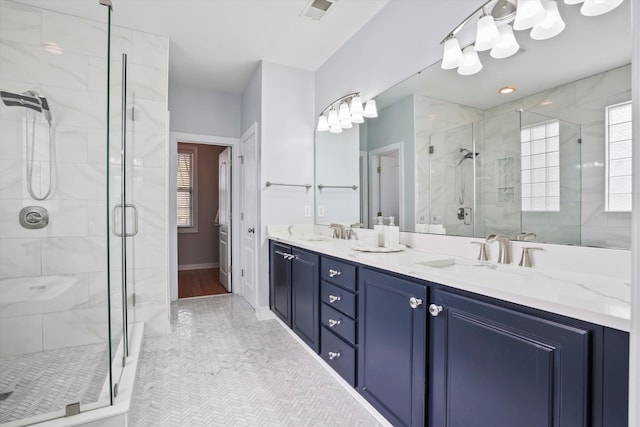 3526 Stockton Dr, Mount Pleasant, SC 29466 - full bathroom with a sink, visible vents, double vanity, and a stall shower