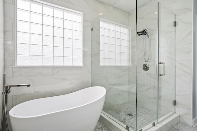 3526 Stockton Dr, Mount Pleasant, SC 29466 - full bath with tile walls, a freestanding tub, and a stall shower