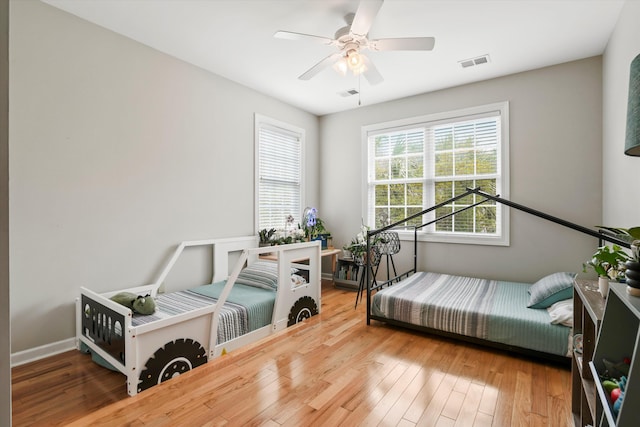 3526 Stockton Dr, Mount Pleasant, SC 29466 - bedroom with visible vents, baseboards, a ceiling fan, and wood finished floors