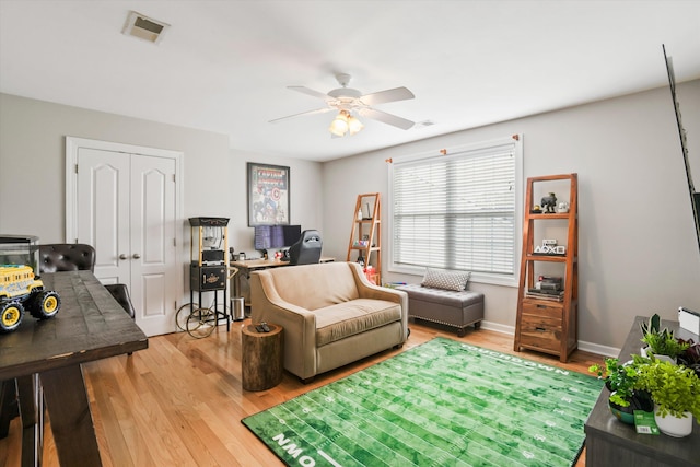 3526 Stockton Dr, Mount Pleasant, SC 29466 - living room with baseboards, light wood-style flooring, visible vents, and ceiling fan