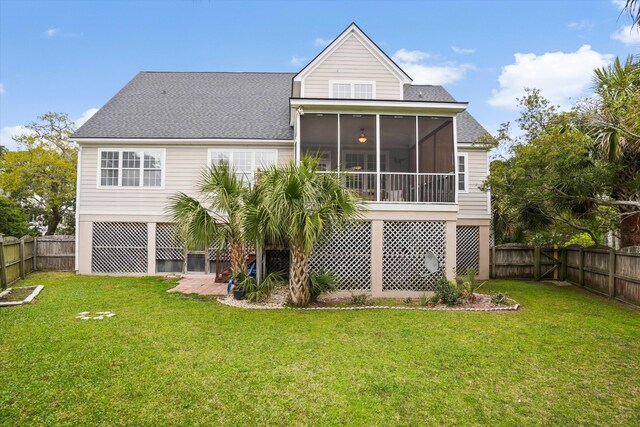 3526 Stockton Dr, Mount Pleasant, SC 29466 - rear view of house featuring a yard, a fenced backyard, a shingled roof, and a sunroom
