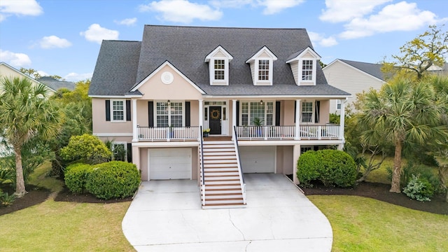 3526 Stockton Dr, Mount Pleasant, SC 29466 - coastal home featuring covered porch, a front lawn, stairs, an attached garage, and driveway