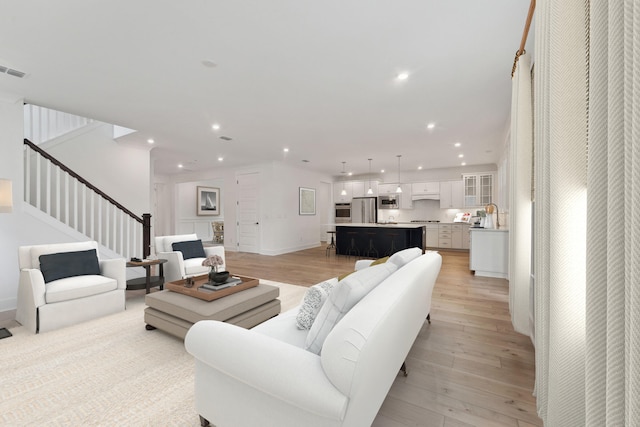 living room featuring light hardwood / wood-style flooring