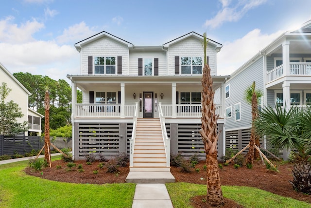 coastal home featuring a porch