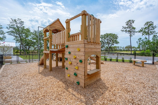 view of jungle gym with a water view