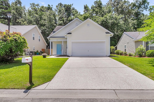 252 Island Green Rd, Goose Creek, SC 29445 - view of front facade featuring driveway, an attached garage, and a front lawn