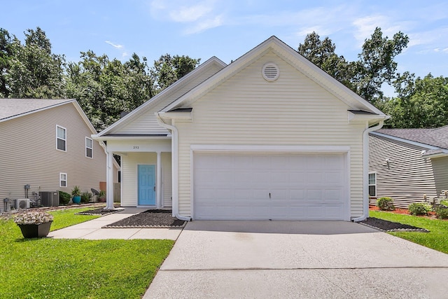 252 Island Green Rd, Goose Creek, SC 29445 - view of front of property with driveway, an attached garage, central AC unit, and a front lawn