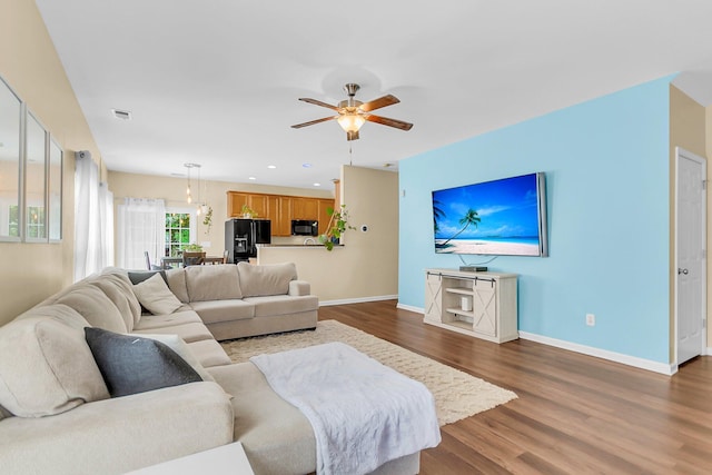 252 Island Green Rd, Goose Creek, SC 29445 - living room featuring dark wood-style flooring, baseboards, a ceiling fan, and recessed lighting