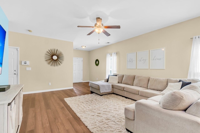 252 Island Green Rd, Goose Creek, SC 29445 - living area featuring wood finished floors, a ceiling fan, and baseboards