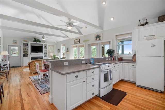 kitchen with white appliances, white cabinetry, vaulted ceiling with beams, and light wood-type flooring