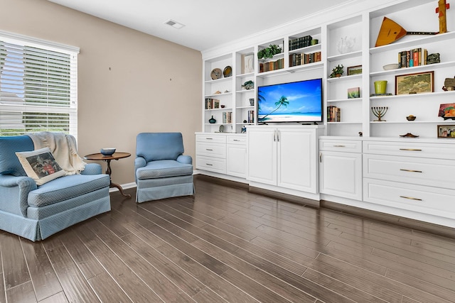 living area featuring dark hardwood / wood-style floors