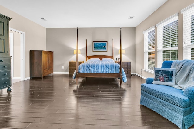 bedroom featuring dark hardwood / wood-style floors