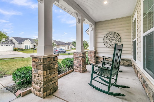 view of patio featuring a porch