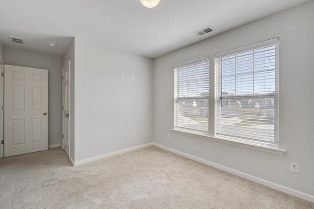 491 Fox Sparrow Ct, Summerville, SC 29486 - carpeted spare room with baseboards and visible vents