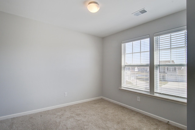 491 Fox Sparrow Ct, Summerville, SC 29486 - empty room with baseboards, visible vents, and light colored carpet
