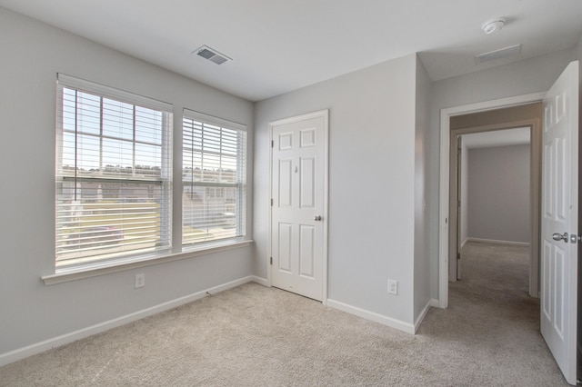 491 Fox Sparrow Ct, Summerville, SC 29486 - unfurnished bedroom with baseboards, carpet floors, and visible vents